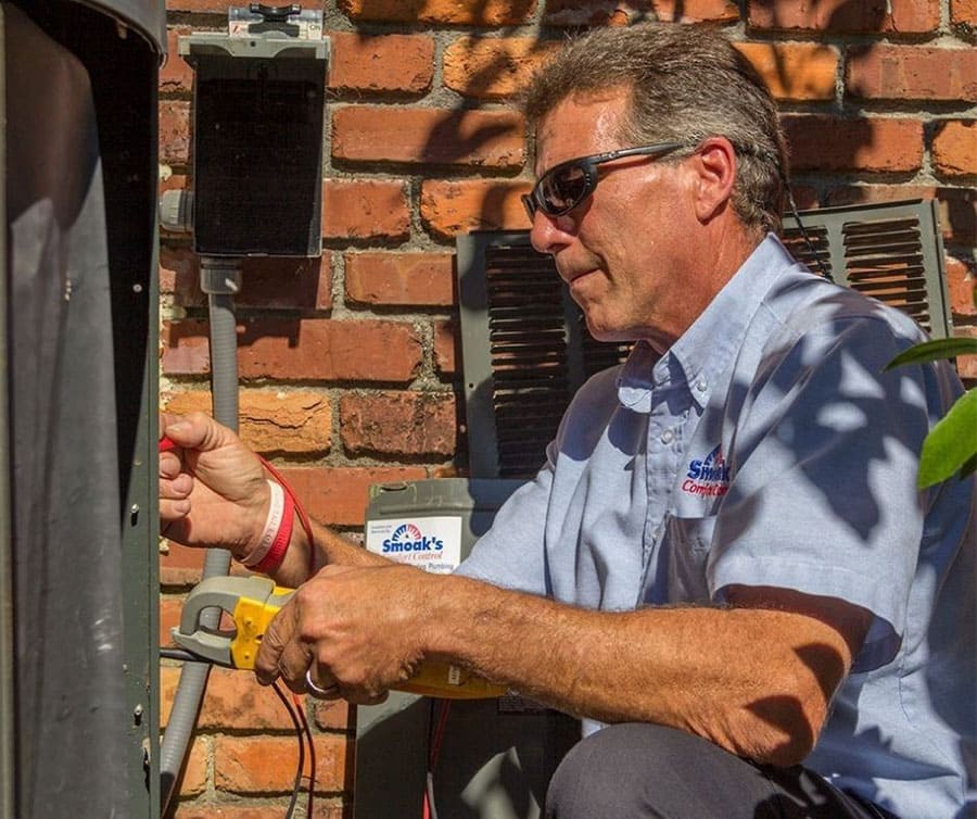 AC tune-up in progress